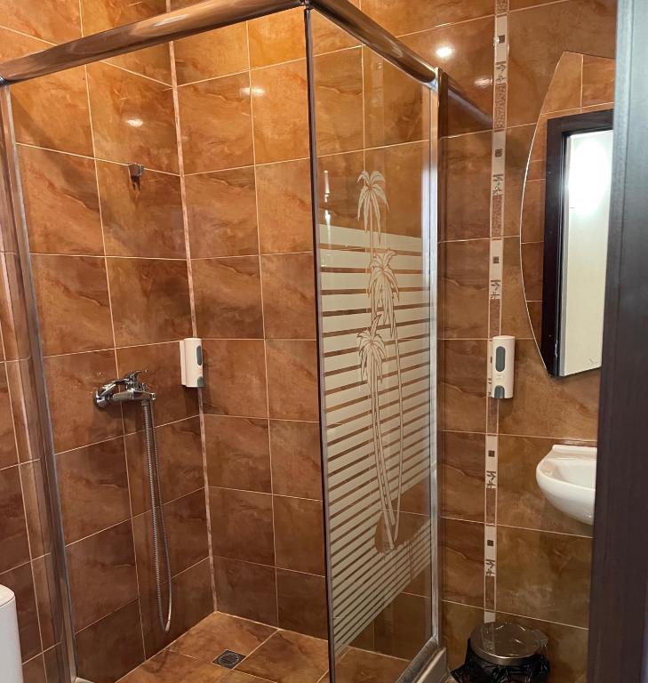 A bathroom at At the American's Hotel