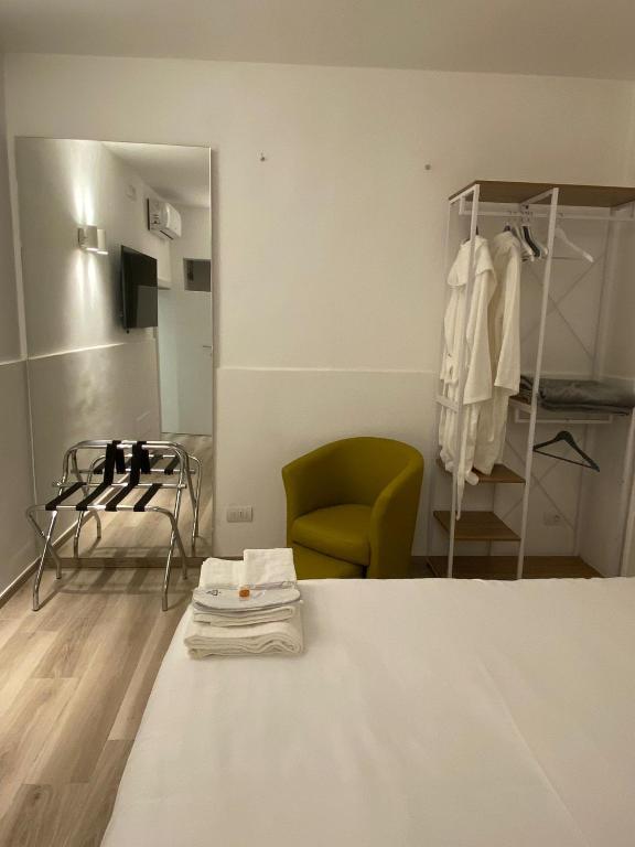 Postel nebo postele na pokoji v ubytování Visavi' Luxury Room