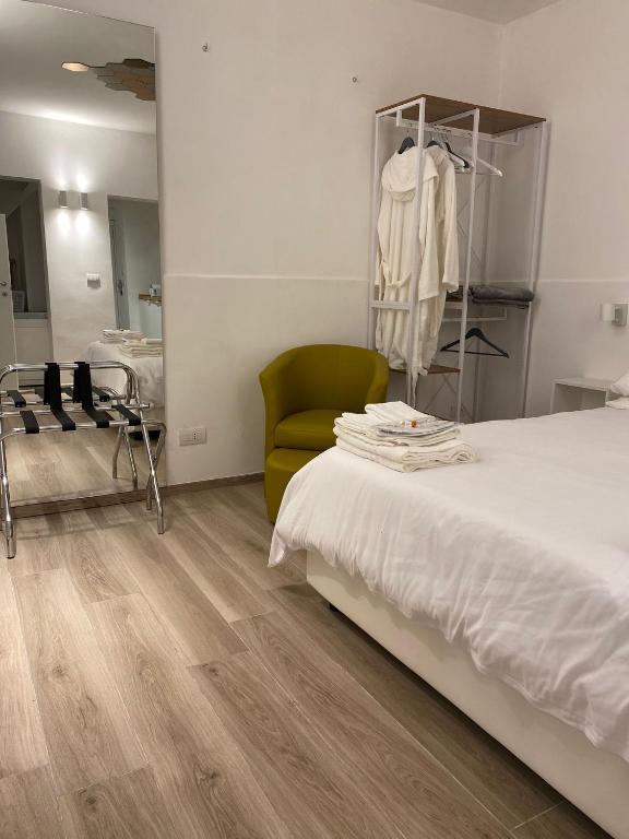 Postel nebo postele na pokoji v ubytování Visavi' Luxury Room