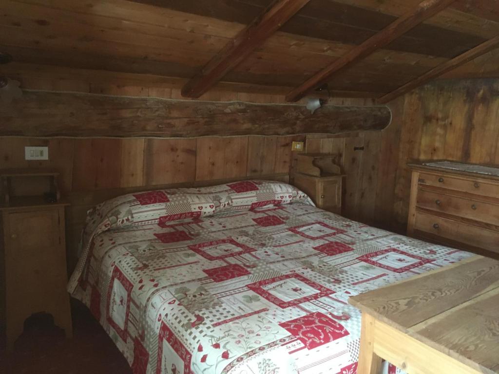 Posteľ alebo postele v izbe v ubytovaní Chalet del Lago