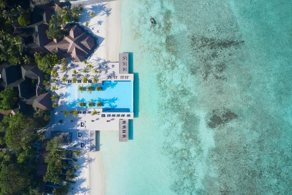 an aerial view of the beach and the ocean at Villa Nautica Paradise Island Resort in North Male Atoll