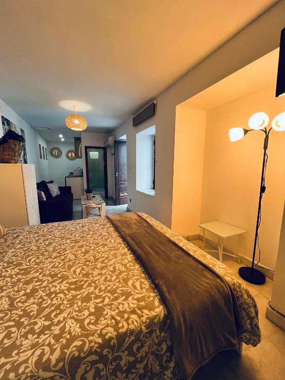 Posteľ alebo postele v izbe v ubytovaní Casa Qurtuba