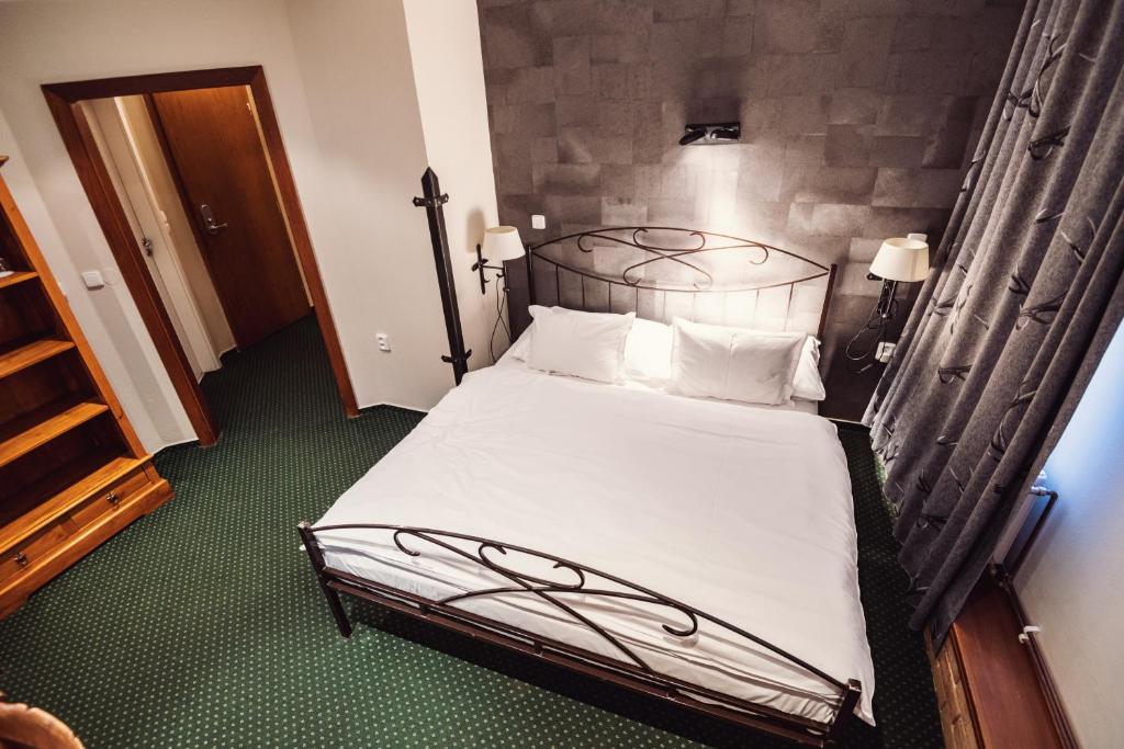 Letto o letti in una camera di Šumava Inn
