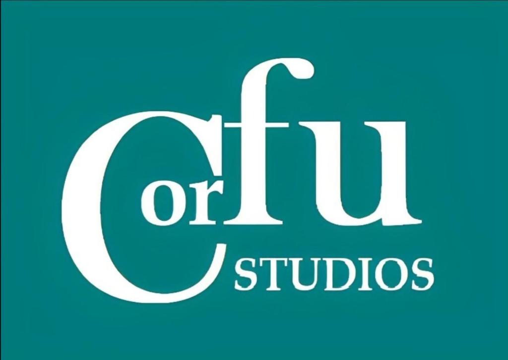 un cartello con le parole "otu studios" di Joy New Port Studio Corfu town a Città di Corfù