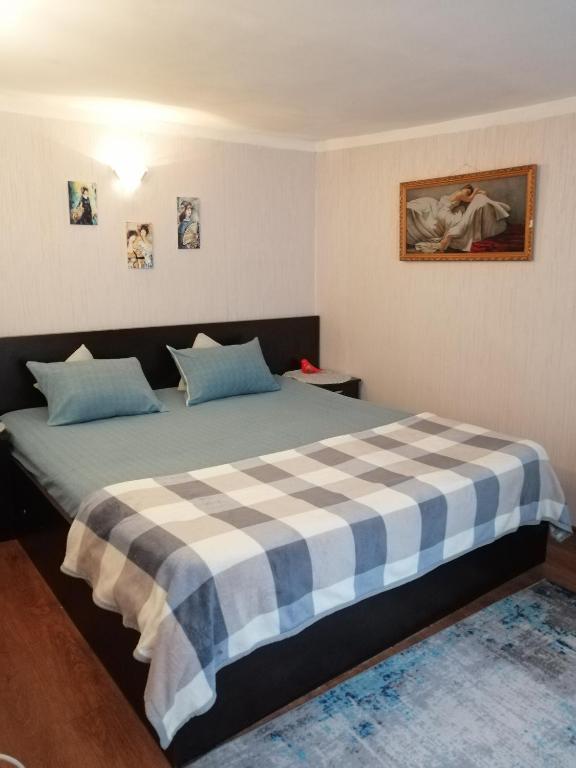 Postel nebo postele na pokoji v ubytování Guest House Marina