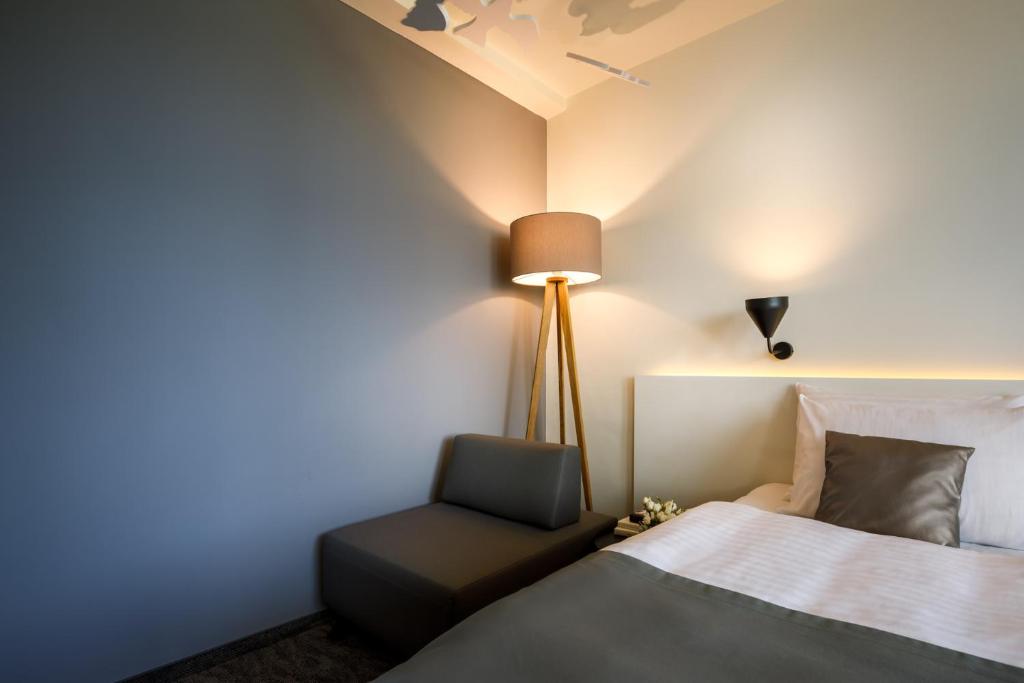 Postel nebo postele na pokoji v ubytování Remisens Hotel Albatros-All inclusive