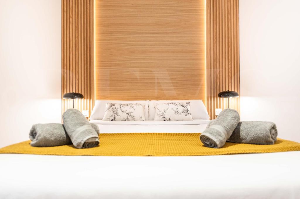 Posteľ alebo postele v izbe v ubytovaní Luxe apartment in the Historic Center by REMS