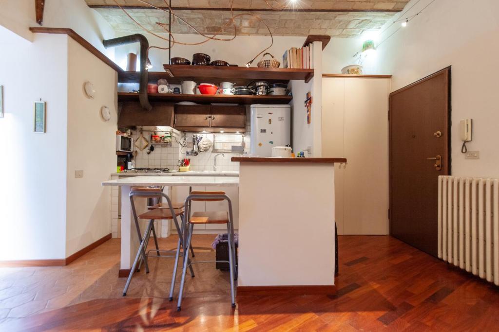 A kitchen or kitchenette at Il giardino di Bobo
