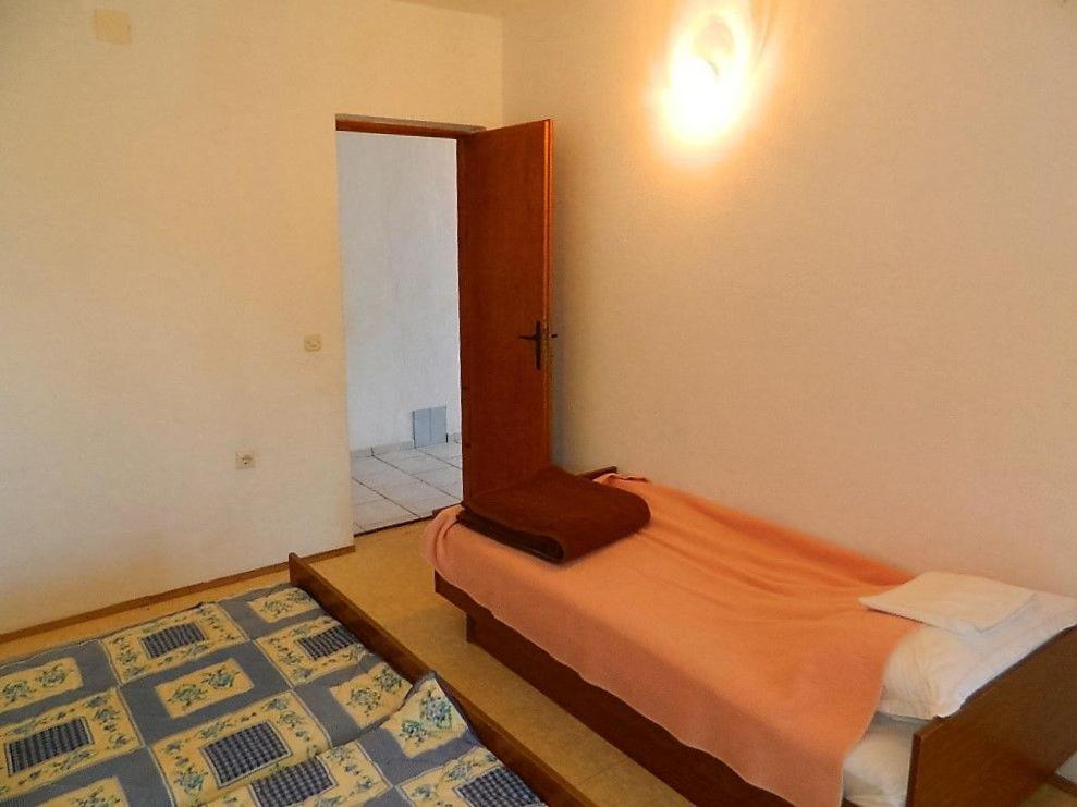 Posteľ alebo postele v izbe v ubytovaní House Fani