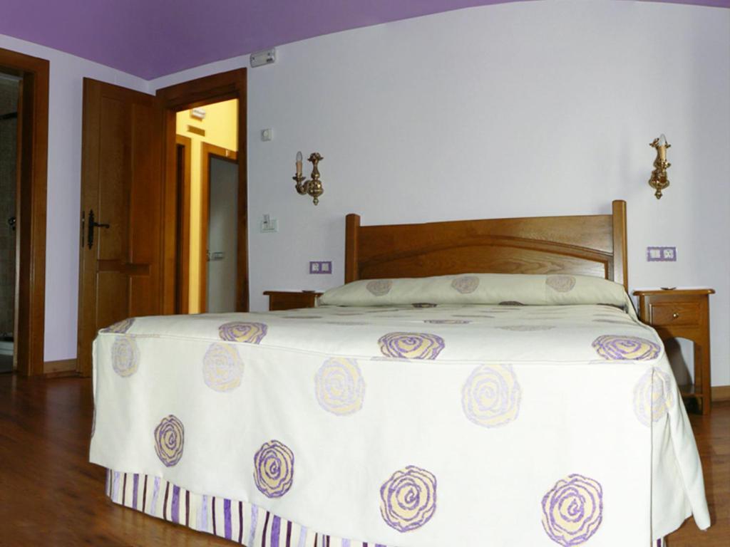 Postel nebo postele na pokoji v ubytování Posada Ribera del Pas