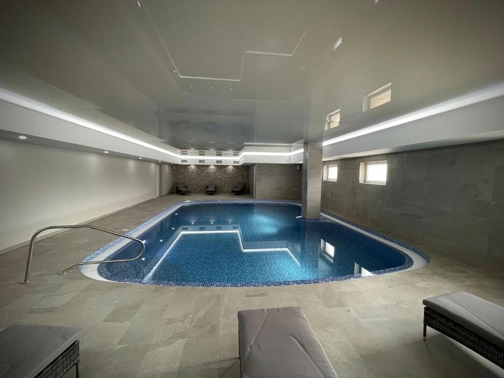 Bazén v ubytování Lázeňský hotel Pyramida nebo v jeho okolí