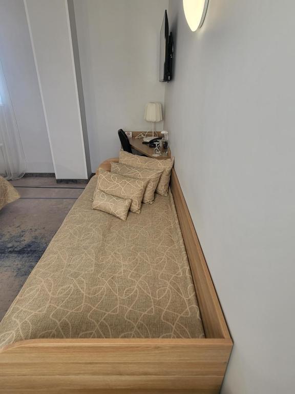 Postel nebo postele na pokoji v ubytování Green Vilnius Hotel