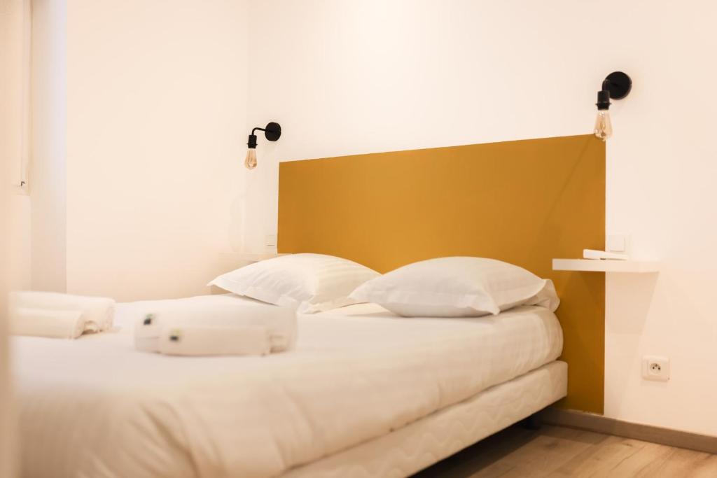 Posteľ alebo postele v izbe v ubytovaní IMMOGROOM - 10 min from the city center - Renovated - Nice and cosy
