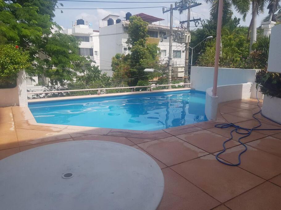 Swimming pool sa o malapit sa Lujoso Departamento en Zona Dorada de Acapulco