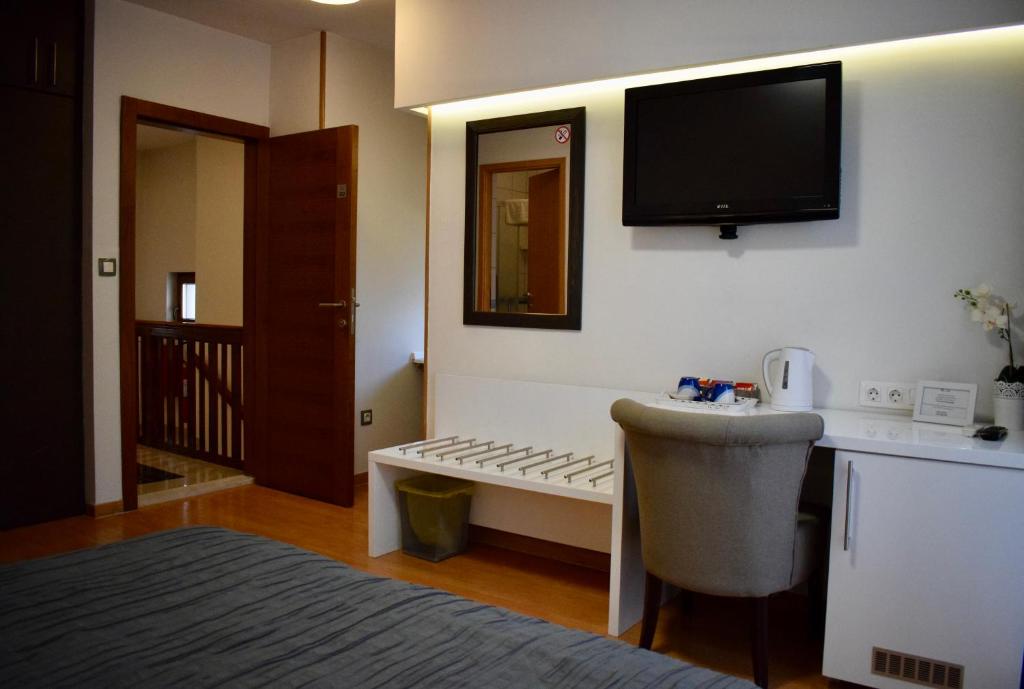 Postel nebo postele na pokoji v ubytování Hotel Divan