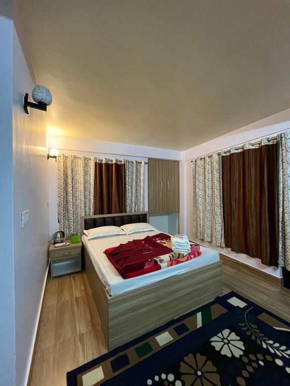 Postel nebo postele na pokoji v ubytování Hannah Homestay
