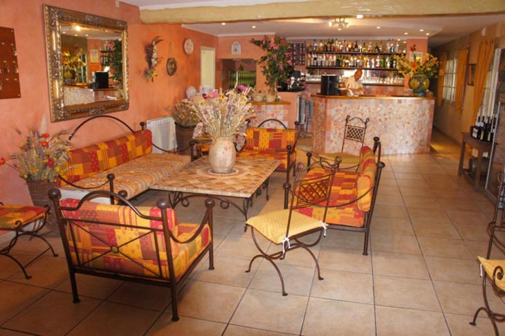 Nápoje v ubytování Hotel Les Cavalets