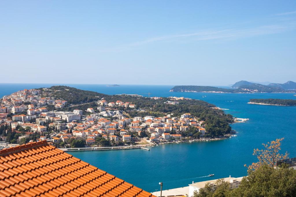 a view of a town on a body of water at Bellevue Duplex Apartment in Dubrovnik
