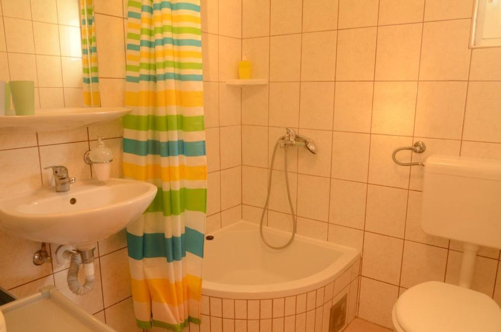 Kúpeľňa v ubytovaní Apartments Lumini