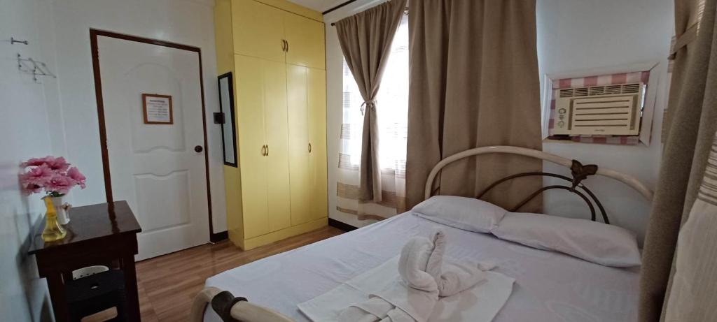 Postel nebo postele na pokoji v ubytování Donsol Aguluz Homestay