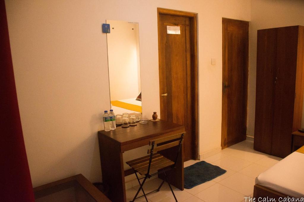 Postel nebo postele na pokoji v ubytování The Calm Cabana
