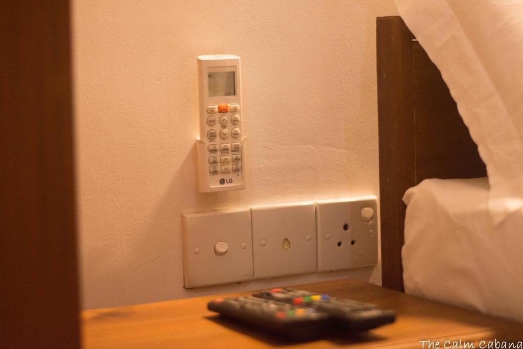 Postel nebo postele na pokoji v ubytování The Calm Cabana