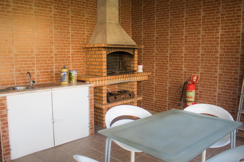Kuchyň nebo kuchyňský kout v ubytování AM Residence