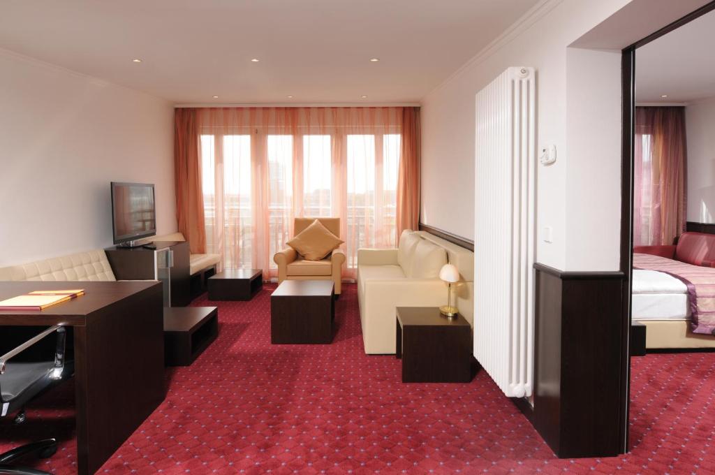 Postel nebo postele na pokoji v ubytování Hotel Klassik Berlin