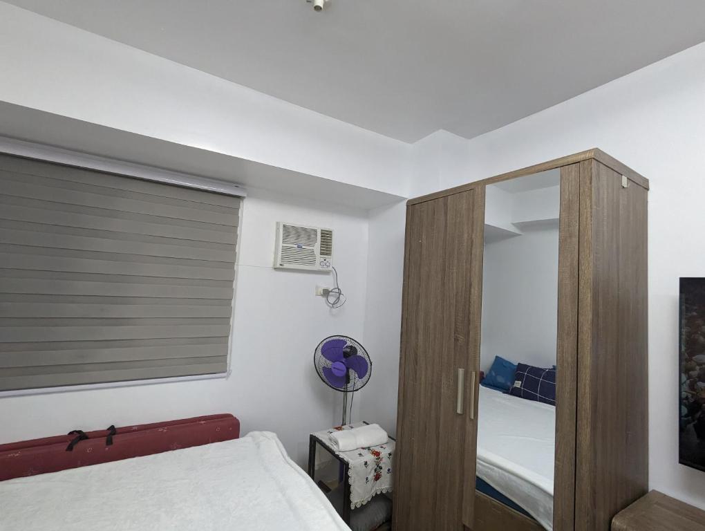 Cinema at Mplace 55 Inch Smart TV google home-music Unliwifi Cooking , Pool extra pay - Apartamento De Una Habitación
