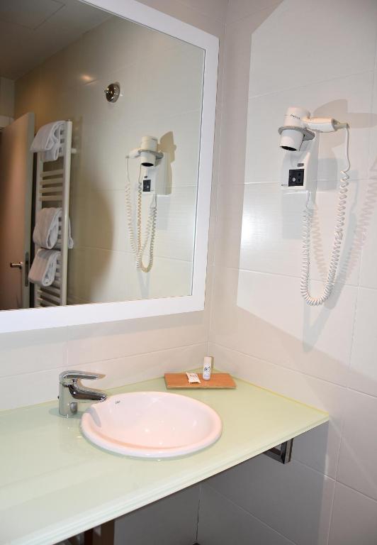 Koupelna v ubytování Hotel y Apartamentos SNÖ Isaba
