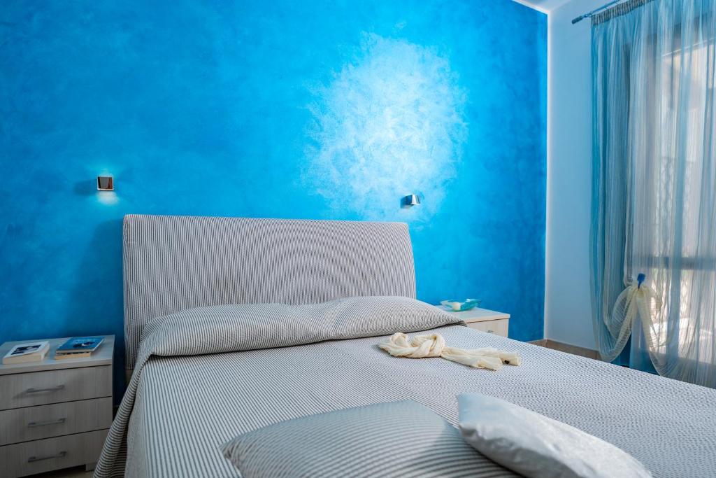 Posteľ alebo postele v izbe v ubytovaní B&B Pietre Preziose