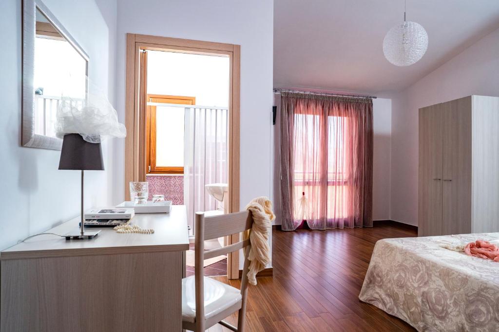 Posteľ alebo postele v izbe v ubytovaní B&B Pietre Preziose