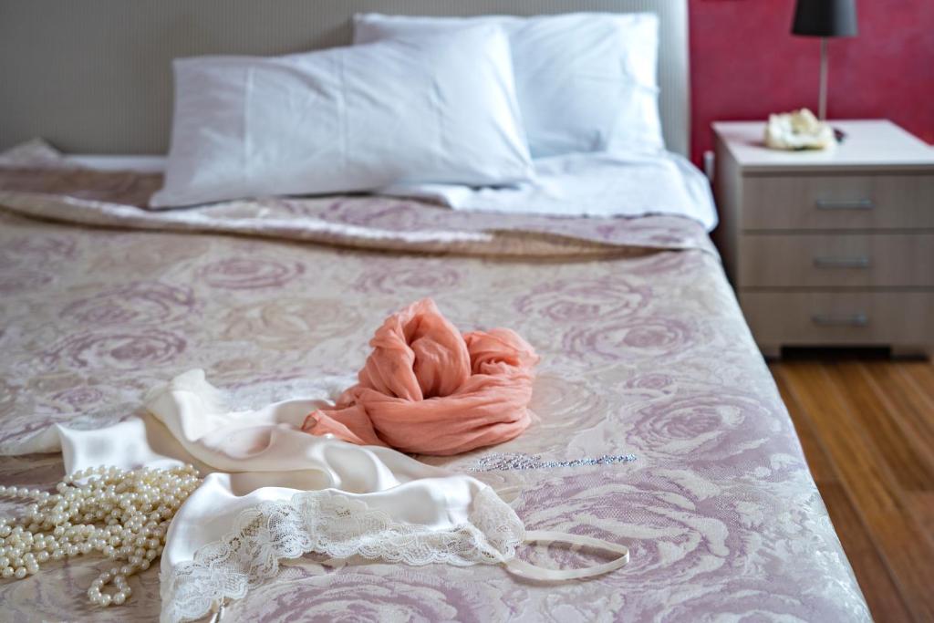 Posteľ alebo postele v izbe v ubytovaní B&B Pietre Preziose