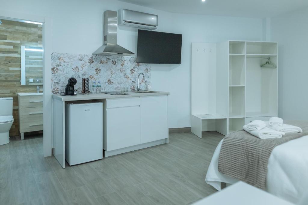 Kuchyň nebo kuchyňský kout v ubytování A&M CAVA