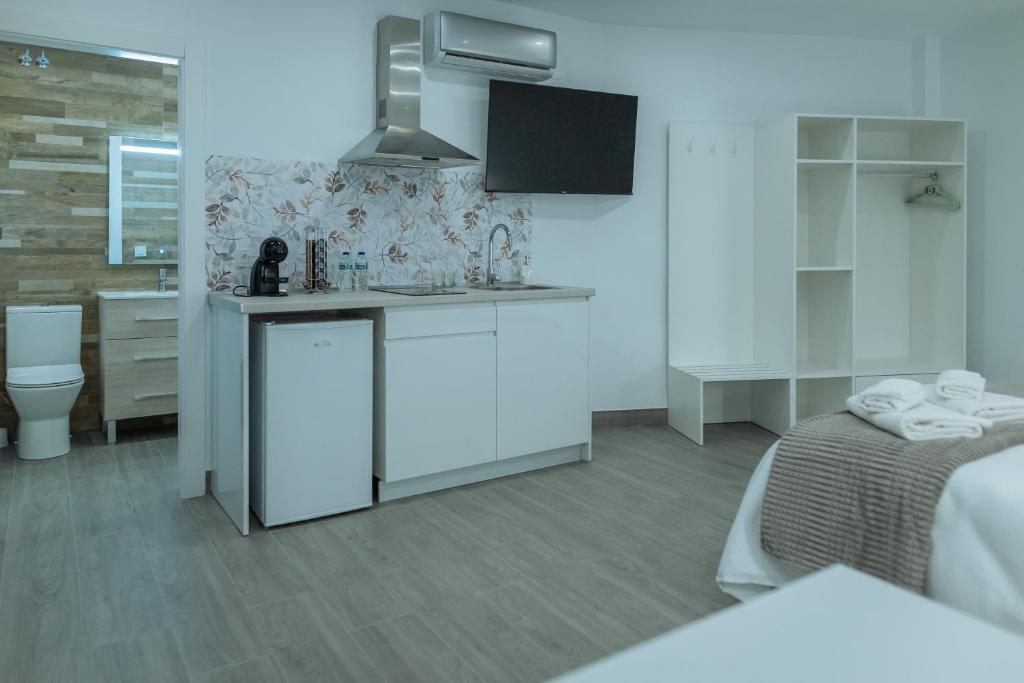 Kuchyň nebo kuchyňský kout v ubytování A&M CAVA