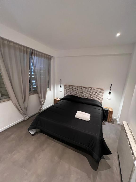 Postel nebo postele na pokoji v ubytování Villa Chiara Taormina