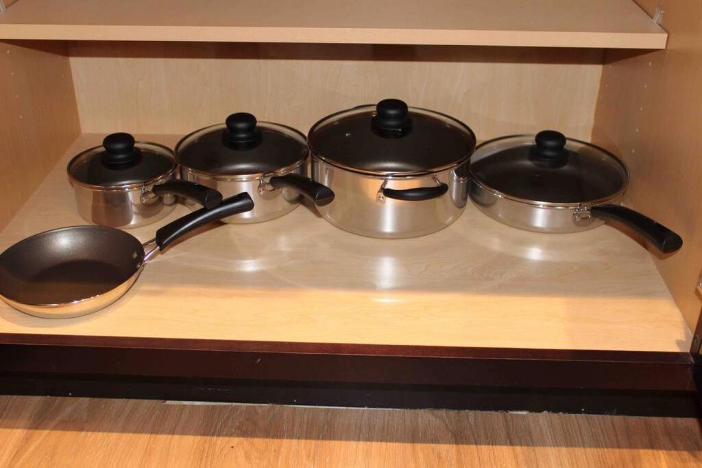 a group of pots and pans sitting on a stove at Affordable One Bedroom Rockford in Rockford