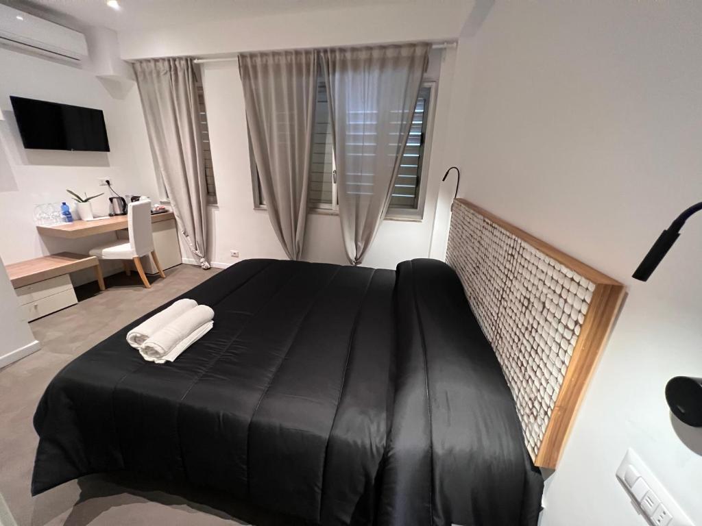 Postel nebo postele na pokoji v ubytování Villa Chiara Taormina