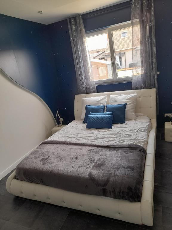 Postel nebo postele na pokoji v ubytování Chambres 2 caps