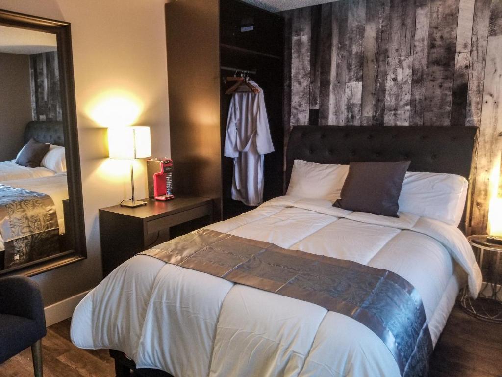 Postel nebo postele na pokoji v ubytování 7 Day's Hotel