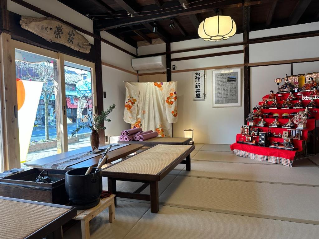 a room with a table and a shelf of soda cans at Ogawayado Korin - Vacation STAY 95244v in Namegawa
