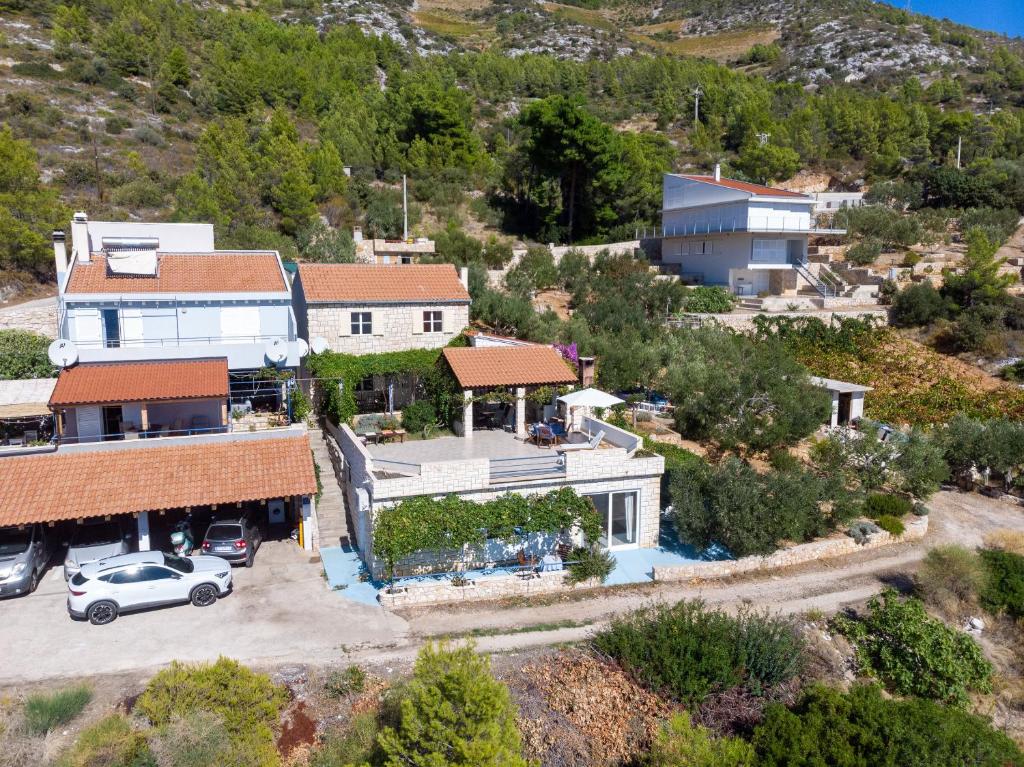 an aerial view of a house with a parking lot at Apartment Asja in Ivan Dolac