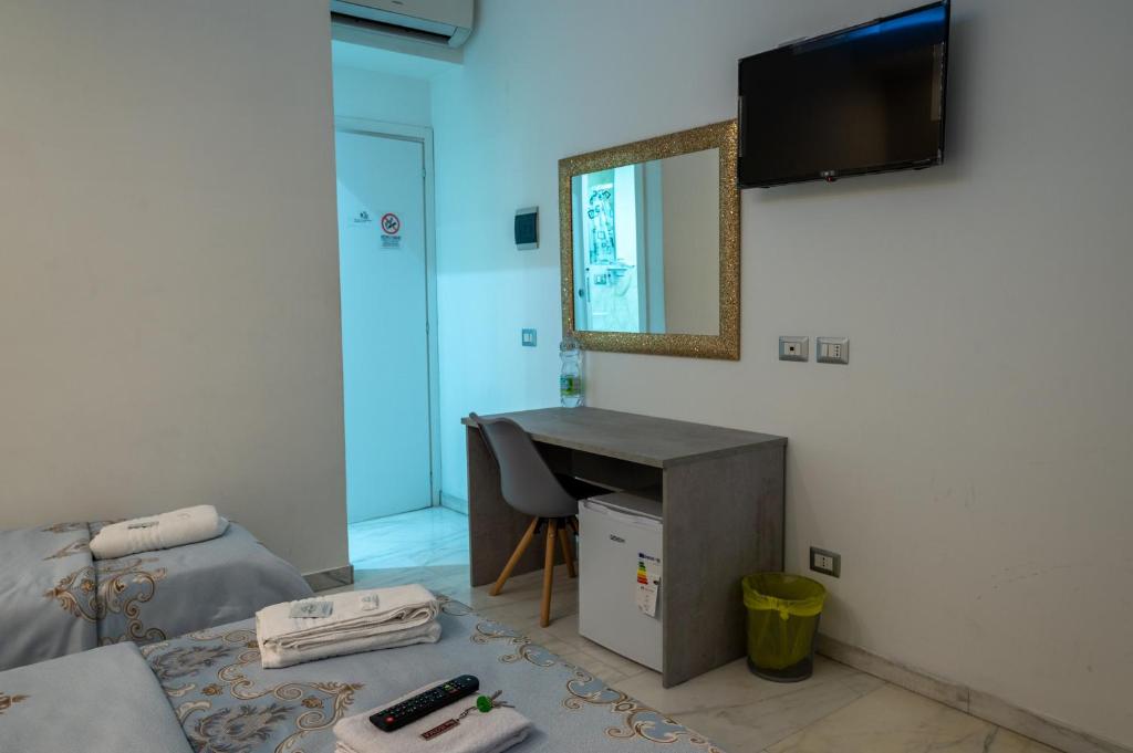 A television and/or entertainment centre at Santa Maria Accommodation