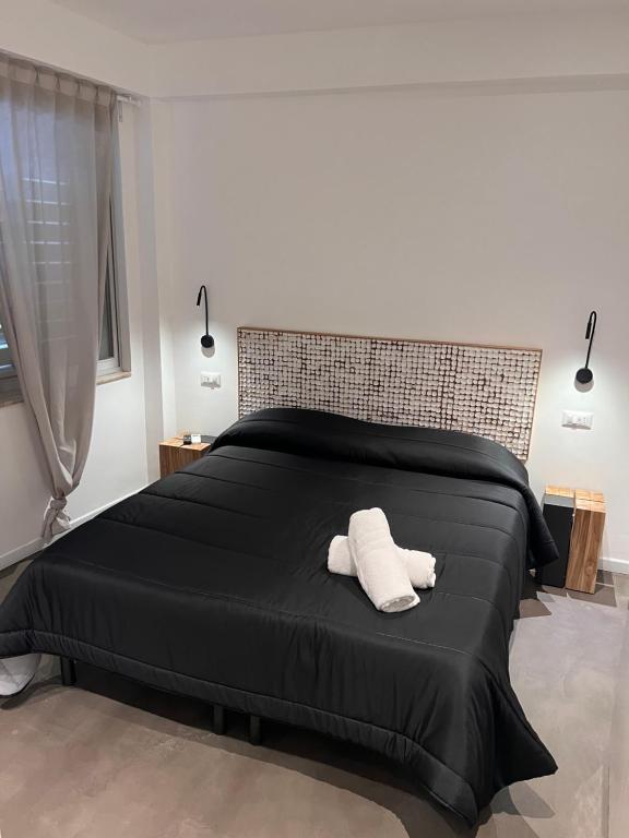 Postel nebo postele na pokoji v ubytování Villa Chiara Taormina