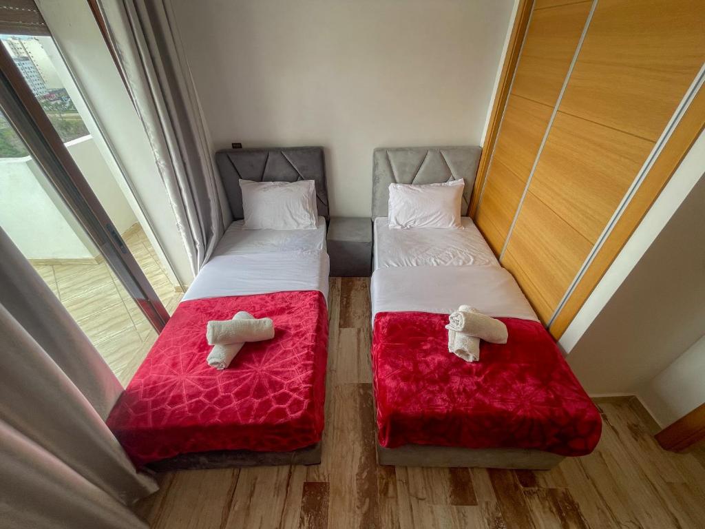 Voodi või voodid majutusasutuse Appart Terrasse Corniche Tanger toas