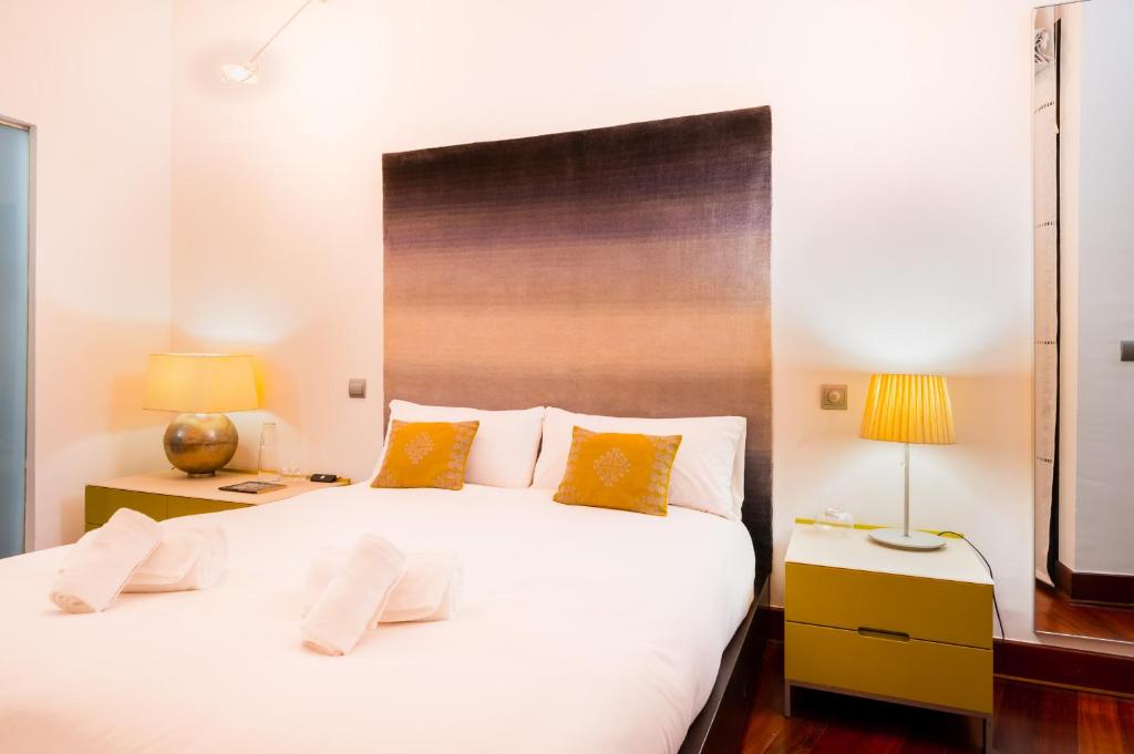 Posteľ alebo postele v izbe v ubytovaní Stylish loft duplex - Alameda