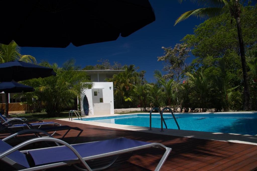 Bazén v ubytování Hotel Horizontes de Montezuma nebo v jeho okolí