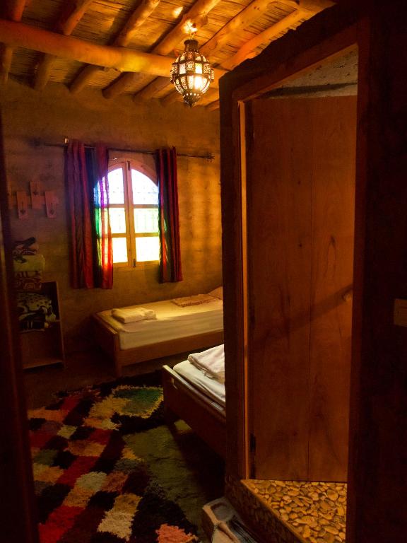 Postel nebo postele na pokoji v ubytování Chambres dans casbah - Gite D'étape Gorges De Ziz