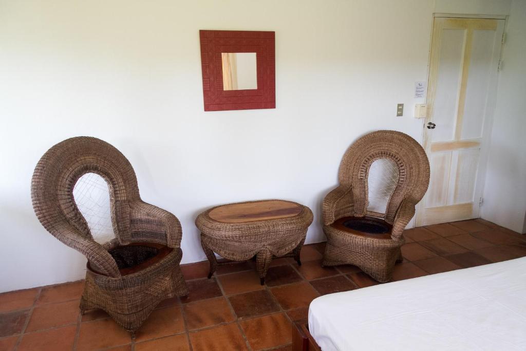 Postel nebo postele na pokoji v ubytování Hotel Horizontes de Montezuma