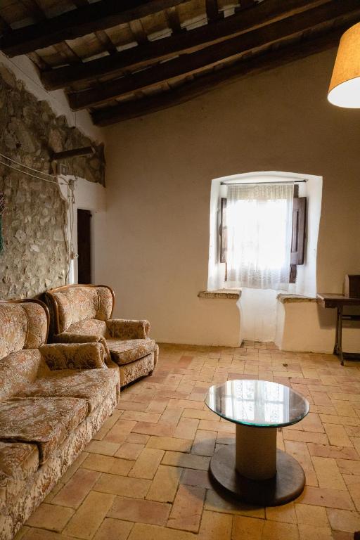 Posezení v ubytování Can Camós - Masia Rural